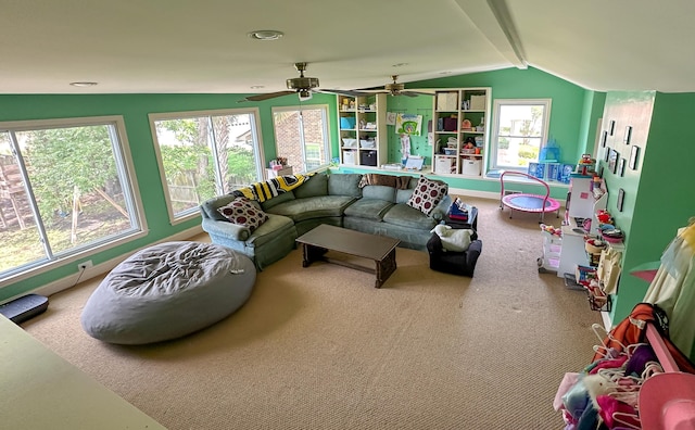 1866 Capri Dr, Charleston, SC 29407 - carpeted living area with vaulted ceiling, ceiling fan, and baseboards