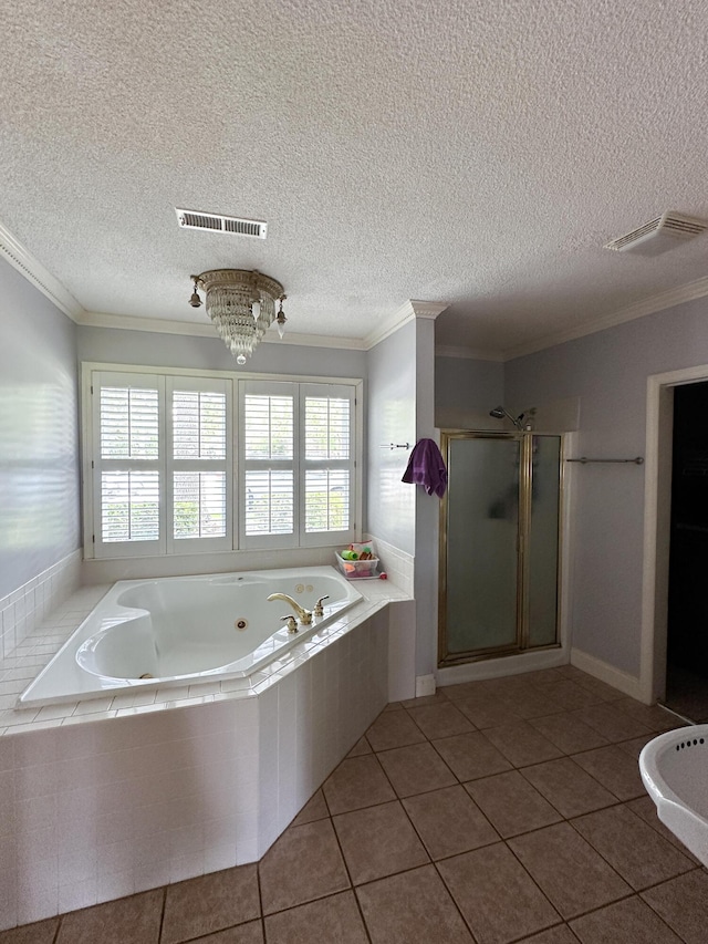 1866 Capri Dr, Charleston, SC 29407 - full bathroom featuring a shower stall, a whirlpool tub, tile patterned flooring, a textured ceiling, and ornamental molding