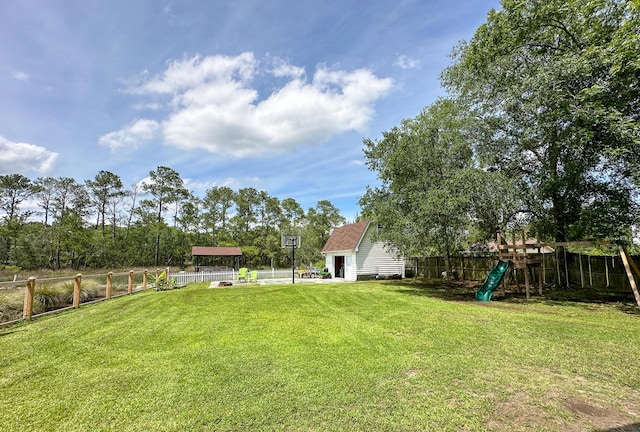 1866 Capri Dr, Charleston, SC 29407 - view of yard featuring a playground and an outbuilding