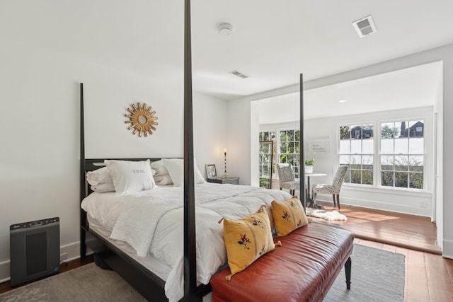 bedroom featuring wood-type flooring