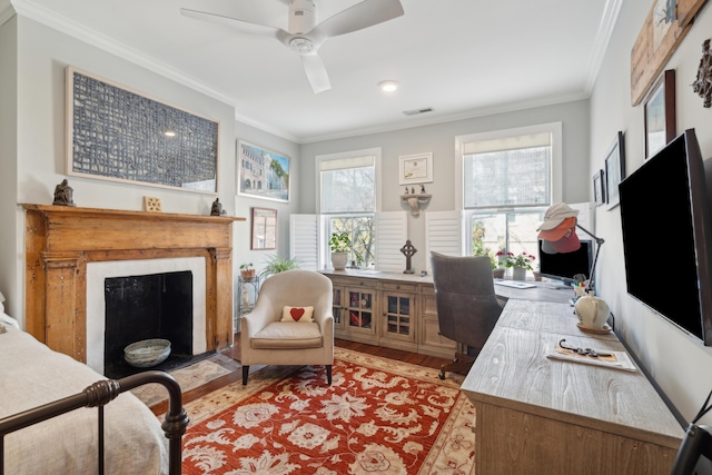 office space with light hardwood / wood-style flooring, ceiling fan, and ornamental molding