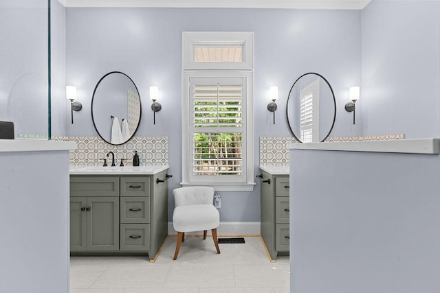 3052 Seabrook Island Rd, Seabrook Island, SC 29455 - bathroom with backsplash, vanity, tile patterned flooring, and baseboards