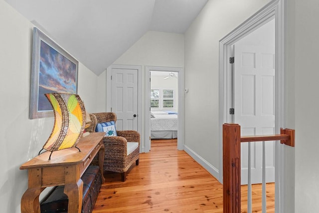 3052 Seabrook Island Rd, Seabrook Island, SC 29455 - corridor featuring light wood-style flooring, lofted ceiling, and baseboards