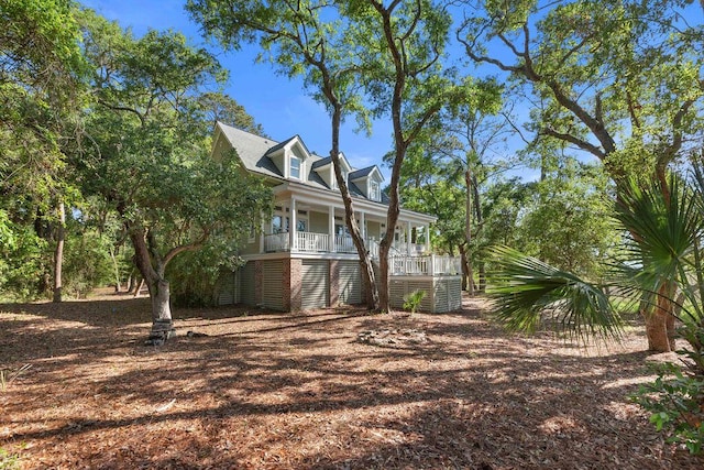 3052 Seabrook Island Rd, Seabrook Island, SC 29455 - view of side of home with a porch and stairway