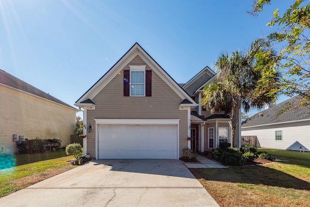 front facade featuring a front yard and a garage