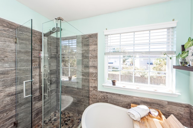 bathroom with independent shower and bath