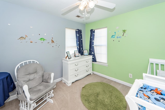 carpeted bedroom featuring ceiling fan