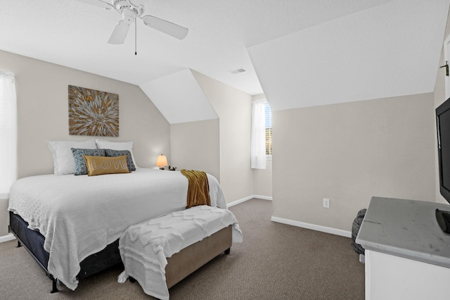 carpeted bedroom with ceiling fan and lofted ceiling