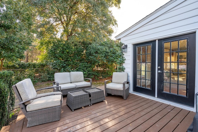 wooden terrace with outdoor lounge area