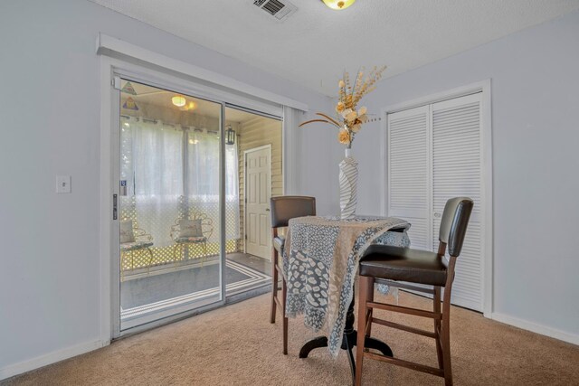 6231 Rolling Fork Rd Unit 1201-A, North Charleston, SC 29406 - carpeted dining area featuring a desk and baseboards