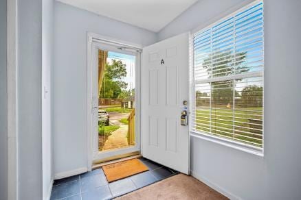 6231 Rolling Fork Rd Unit 1201-A, North Charleston, SC 29406 - entryway with baseboards and tile patterned flooring