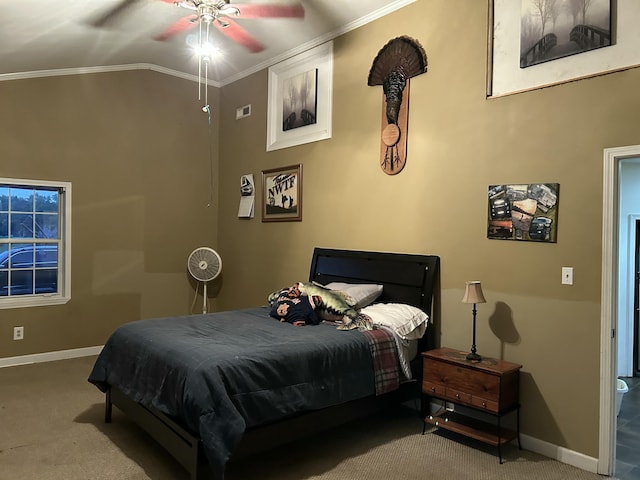bedroom with carpet flooring, crown molding, baseboards, and a ceiling fan