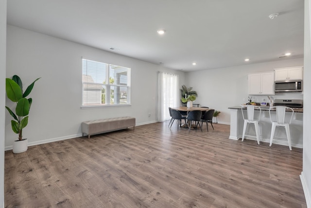 411 Bering Ln, Summerville, SC 29486 - dining area featuring wood finished floors, recessed lighting, and baseboards