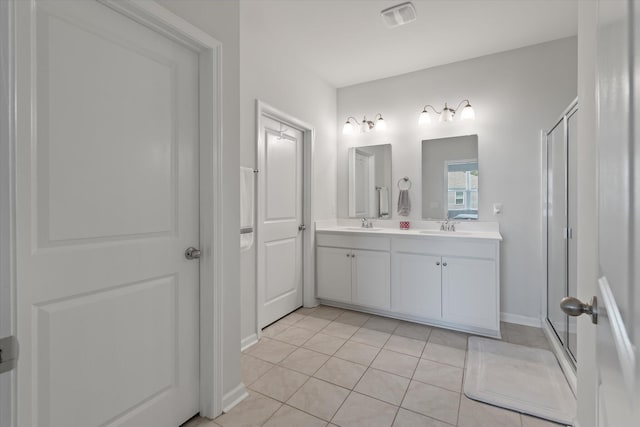 411 Bering Ln, Summerville, SC 29486 - full bath featuring double vanity, a shower stall, tile patterned floors, and baseboards