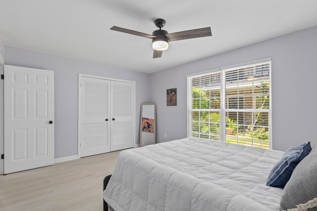867 Colony Dr Unit F92, Charleston, SC 29407 - bedroom with light wood-type flooring, a closet, baseboards, and a ceiling fan