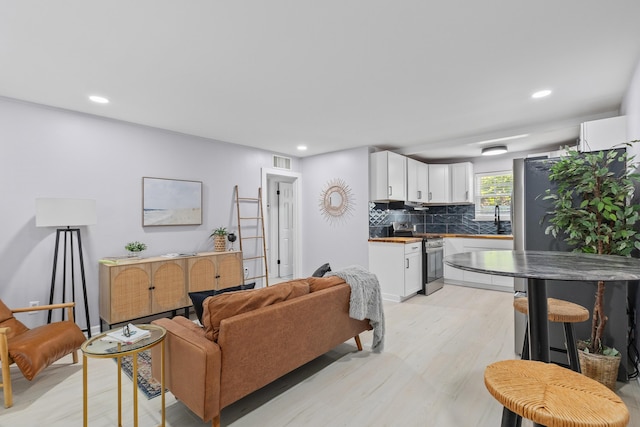 867 Colony Dr Unit F92, Charleston, SC 29407 - living area with light wood-style floors and recessed lighting