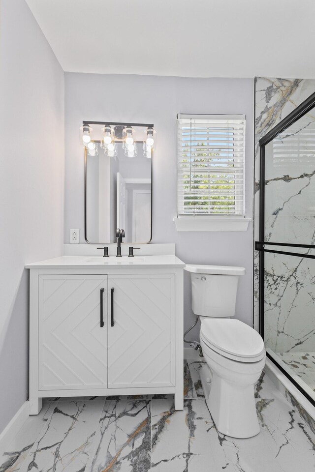 867 Colony Dr Unit F92, Charleston, SC 29407 - bathroom with a marble finish shower, vanity, marble finish flooring, toilet, and baseboards