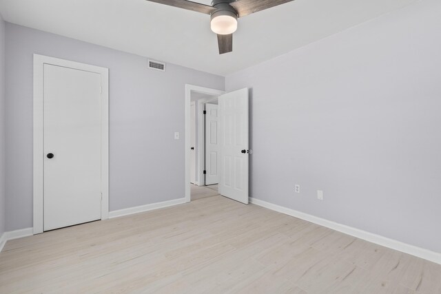 867 Colony Dr Unit F92, Charleston, SC 29407 - unfurnished bedroom with light wood-style floors, baseboards, and ceiling fan
