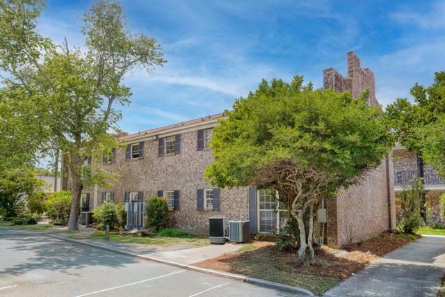 867 Colony Dr Unit F92, Charleston, SC 29407 - view of building exterior with central AC