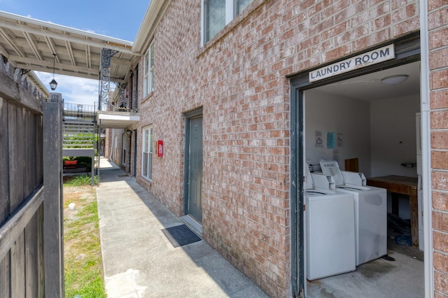 867 Colony Dr Unit F92, Charleston, SC 29407 - doorway to property with washer and clothes dryer and brick siding