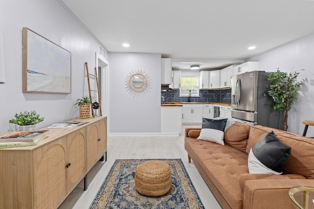 867 Colony Dr Unit F92, Charleston, SC 29407 - living room featuring light wood-type flooring, recessed lighting, and baseboards