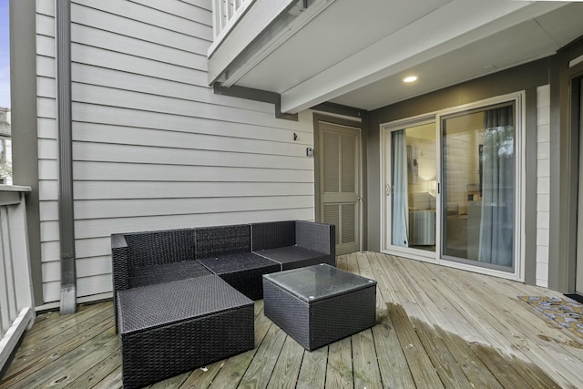 wooden deck featuring an outdoor living space