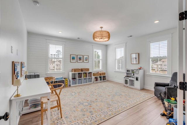 office space featuring recessed lighting, baseboards, and wood finished floors