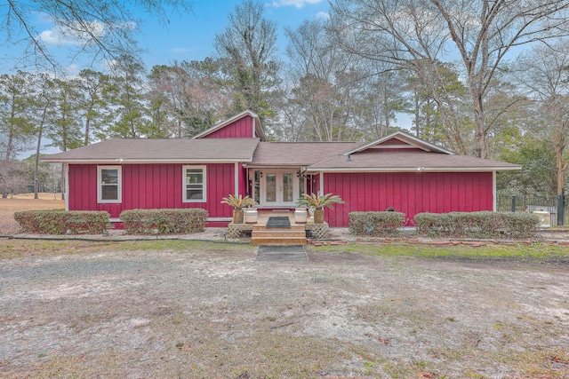 single story home featuring french doors