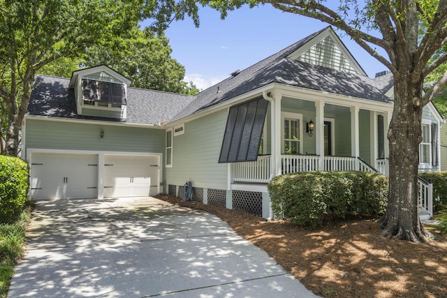 116 Cartright St, Daniel Island, SC 29492 - view of front of house featuring roof with shingles, driveway, a porch, and a garage