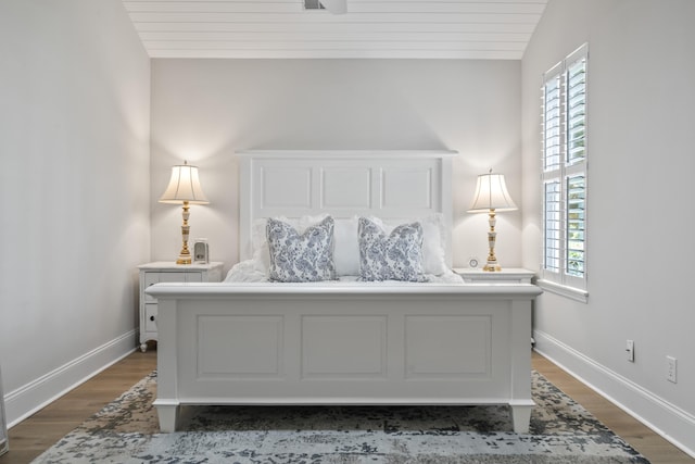 116 Cartright St, Daniel Island, SC 29492 - bedroom with multiple windows, dark wood finished floors, wood ceiling, and lofted ceiling