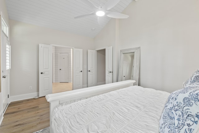 116 Cartright St, Daniel Island, SC 29492 - bedroom with light wood-style floors, high vaulted ceiling, ceiling fan, and beam ceiling
