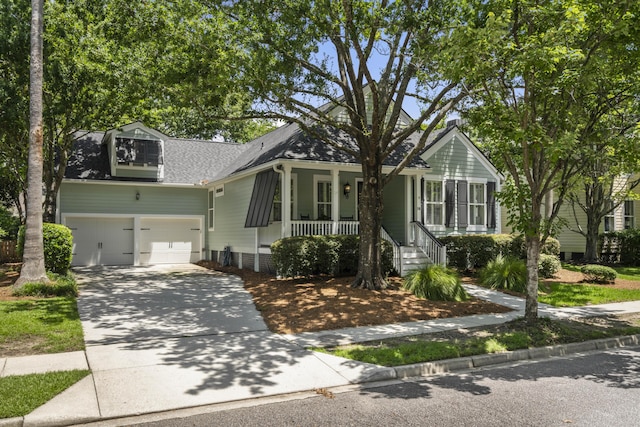116 Cartright St, Daniel Island, SC 29492 - view of front of house featuring concrete driveway, covered porch, and roof with shingles