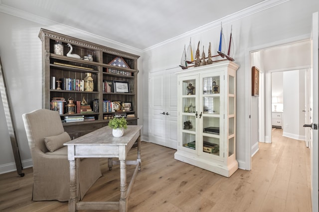 116 Cartright St, Daniel Island, SC 29492 - sitting room with ornamental molding and light wood-style flooring