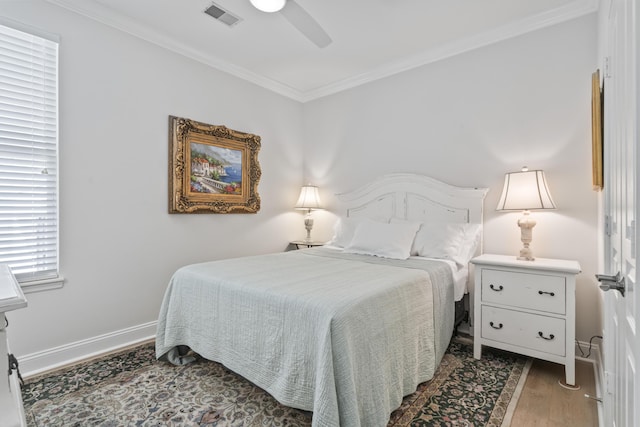 116 Cartright St, Daniel Island, SC 29492 - bedroom with ornamental molding, wood finished floors, and a ceiling fan