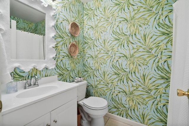 520 Yale Dr, Charleston, SC 29412 - bathroom with wallpapered walls, vanity, toilet, and tile patterned flooring