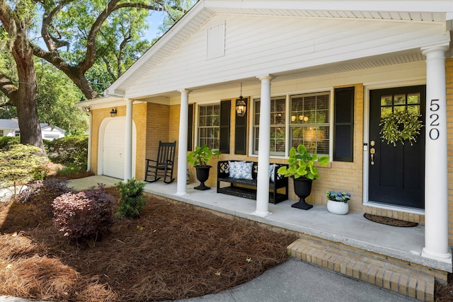520 Yale Dr, Charleston, SC 29412 - property entrance with a porch, brick siding, and a garage