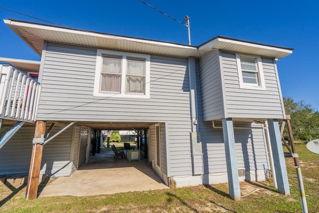 exterior space featuring a carport