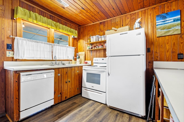 kitchen with wood walls, white appliances, wooden ceiling, sink, and dark hardwood / wood-style floors