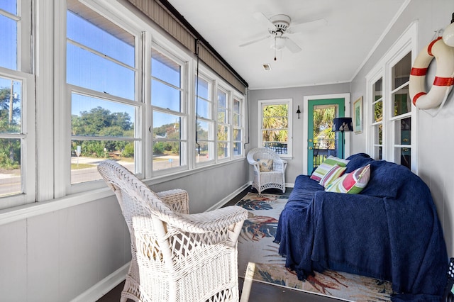 sunroom / solarium with ceiling fan