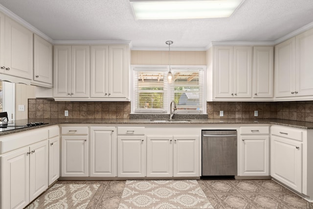 kitchen featuring decorative backsplash, white cabinetry, sink, and hanging light fixtures