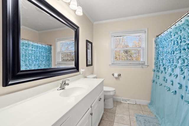 bathroom with a healthy amount of sunlight, vanity, toilet, and tile patterned flooring