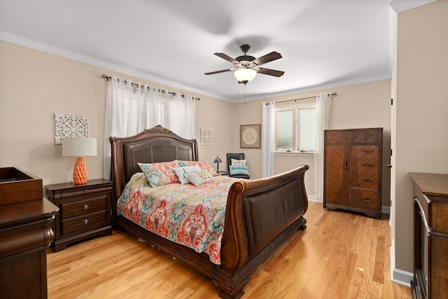 bedroom with ceiling fan, ornamental molding, and light hardwood / wood-style flooring