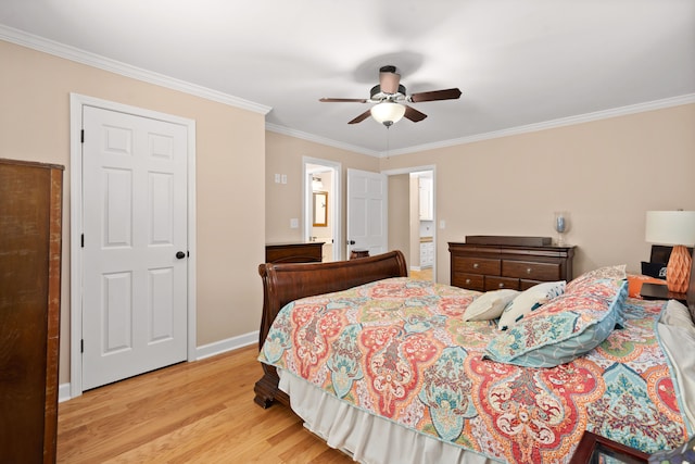 bedroom featuring light hardwood / wood-style floors, crown molding, ensuite bathroom, and ceiling fan