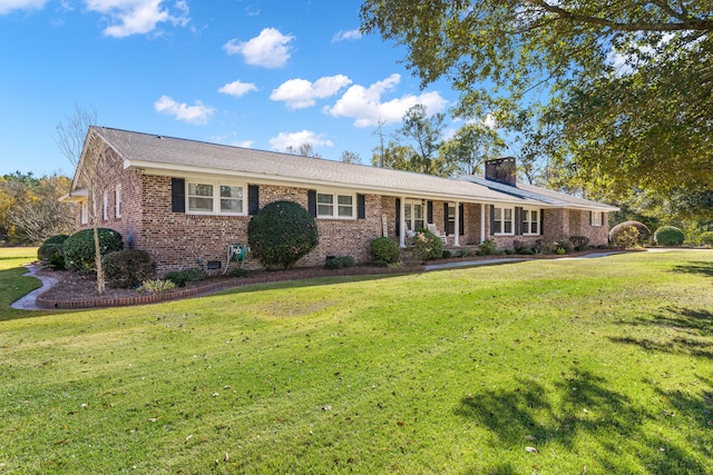 ranch-style house with a front yard