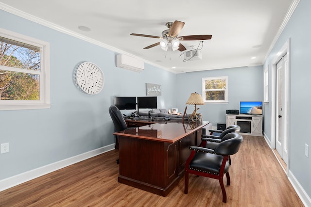 home office featuring a wall unit AC, ornamental molding, hardwood / wood-style flooring, and plenty of natural light