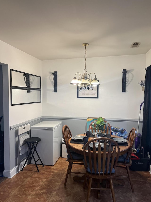 527 Travelers Blvd, Summerville, SC 29485 - dining area featuring a chandelier