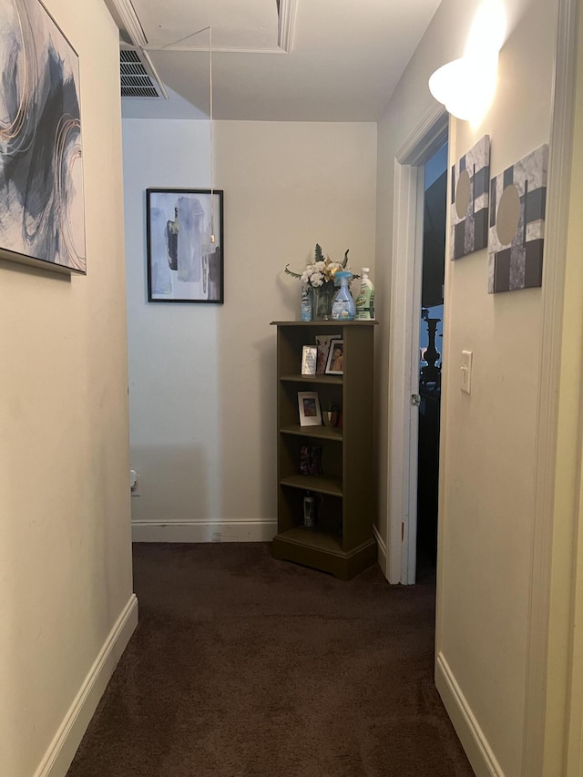 527 Travelers Blvd, Summerville, SC 29485 - hallway featuring attic access, dark colored carpet, and baseboards