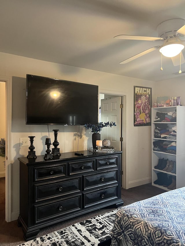 527 Travelers Blvd, Summerville, SC 29485 - bedroom with dark carpet, baseboards, and ceiling fan