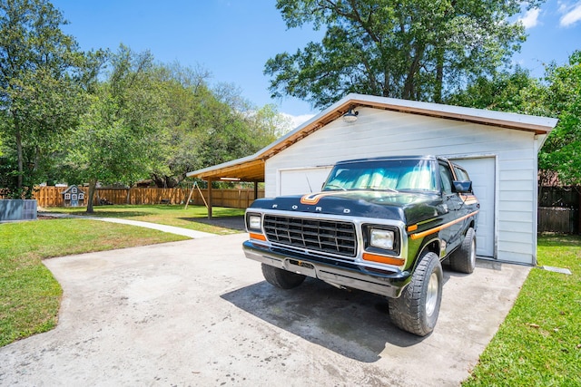 garage featuring fence