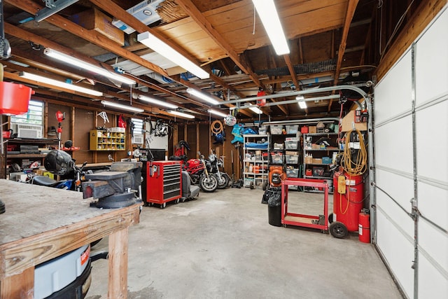 garage with a workshop area